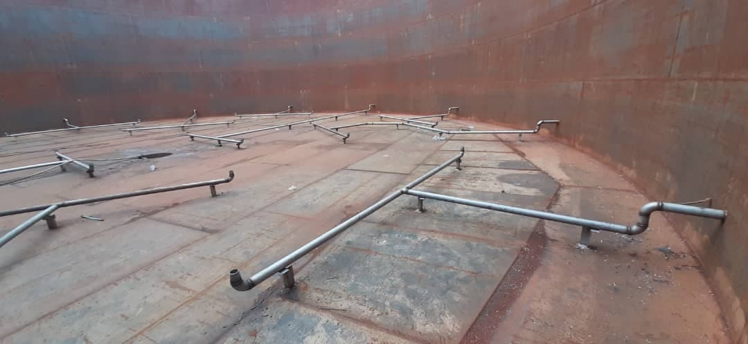 Close view of sequential gas injection piping and nozzles